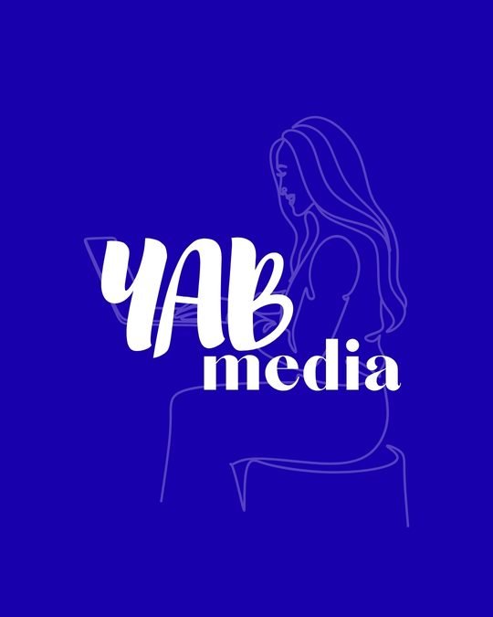 YAB Media logo: white YAB media wordmark over a line drawing of a woman working on a laptop, on royal blue